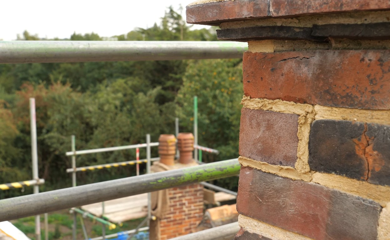 Stone veneer siding installation on residential home in McAllen, TX