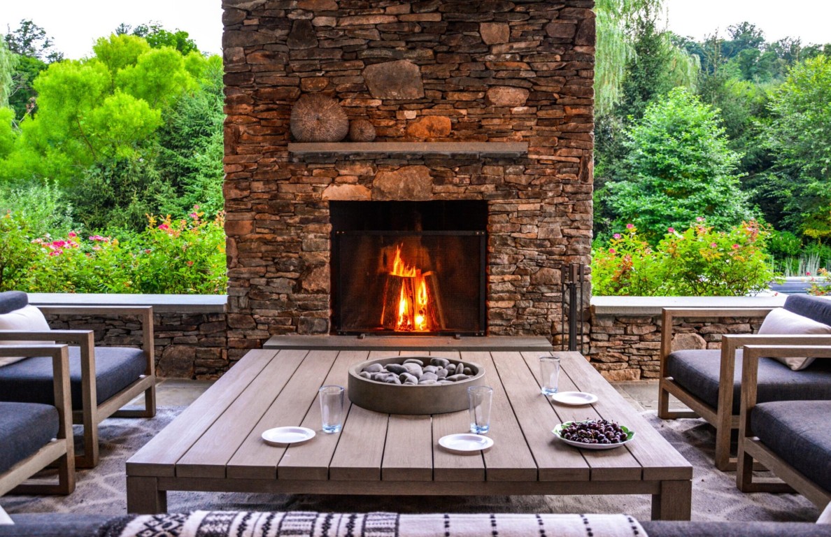 Custom outdoor fireplace and kitchen construction in McAllen, TX