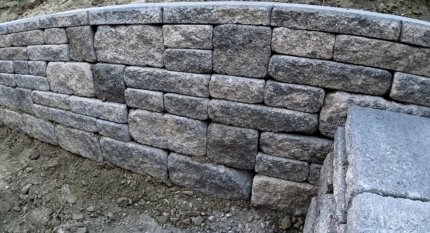 Custom stone retaining wall installation in McAllen, TX